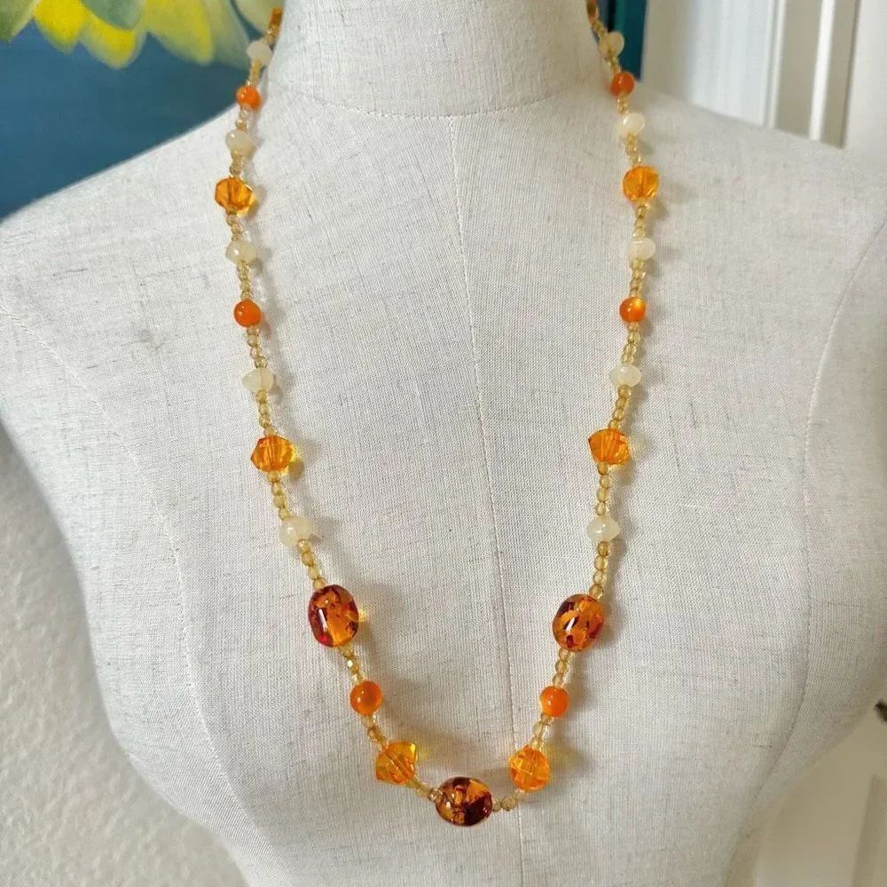 Long orange beaded necklace